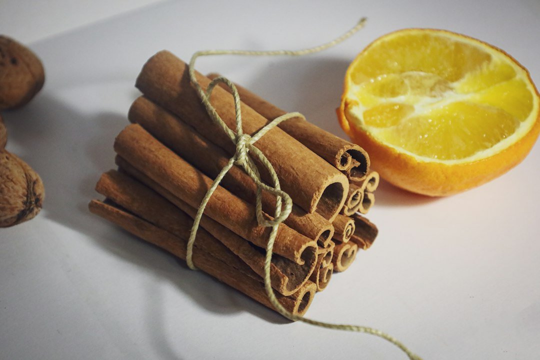 Cinnamon sticks and a fresh orange, the warm spices I use for simmer pots